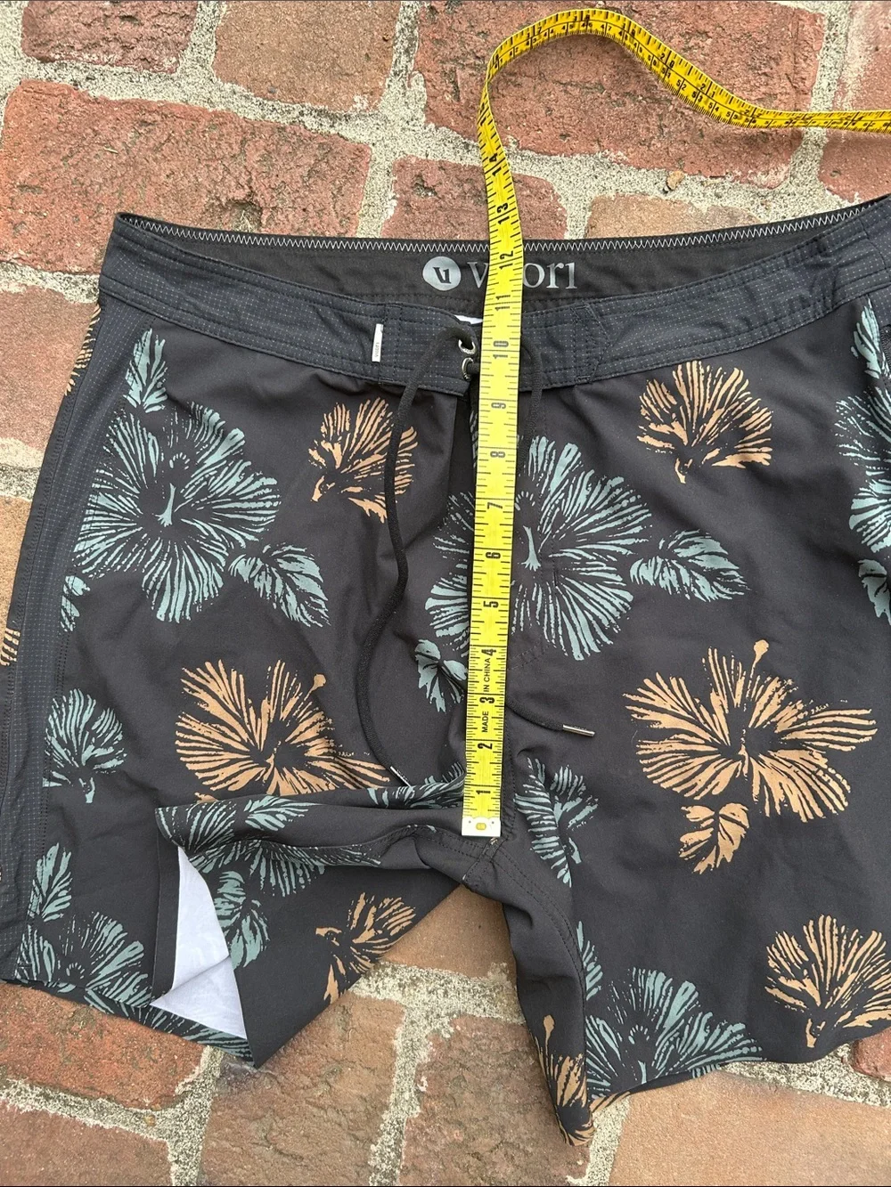 Vuori Black Swim Shorts with Teal & Tan Floral Print